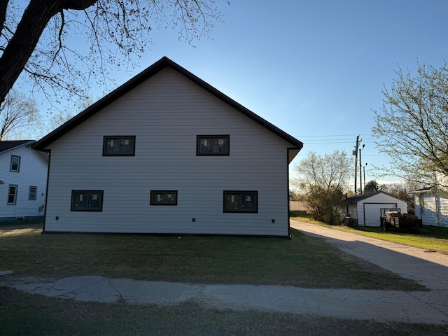 112 3rd Ave, Grand Rapids, MN 55744 - view of property exterior featuring a yard and an outdoor structure