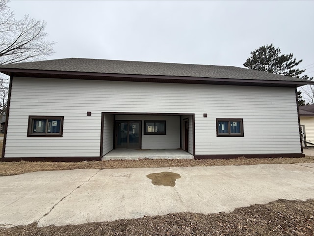 112 3rd Ave, Grand Rapids, MN 55744 - back of property with roof with shingles