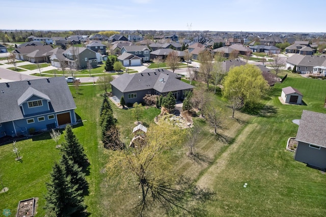 aerial view of property and surrounding area with nearby suburban area