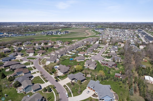 aerial view of property's location featuring nearby suburban area