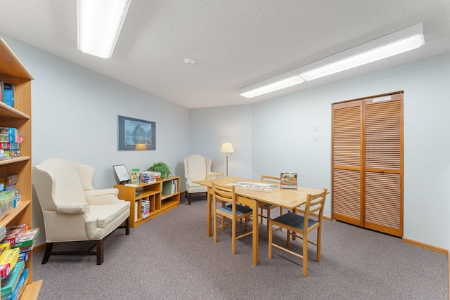dining room featuring carpet