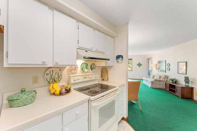 kitchen with white range with electric stovetop, under cabinet range hood, light countertops, white cabinetry, and a textured ceiling