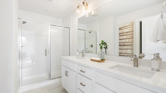 2009 Lusitano St, Shakopee, MN 55379 - bathroom with a shower stall and double vanity