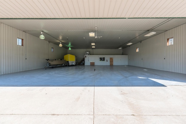 garage featuring a carport