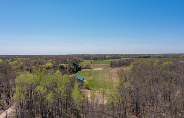 overview of rural landscape featuring a heavily wooded area