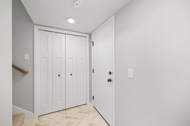 6750 Wildflower Way, Minnetrista, MN 55331 - foyer featuring light marble finish floors, baseboards, and stairs