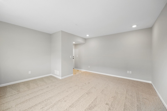 6750 Wildflower Way, Minnetrista, MN 55331 - spare room with light colored carpet, baseboards, and recessed lighting