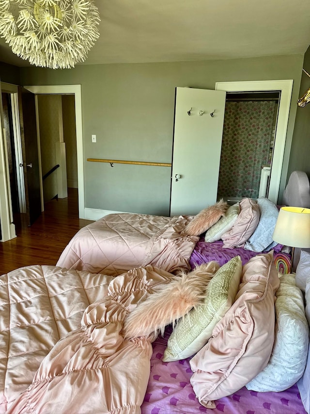 bedroom featuring wood finished floors