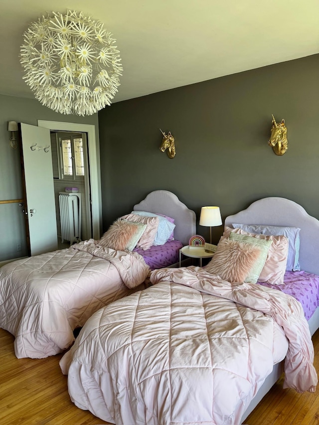 bedroom featuring wood finished floors
