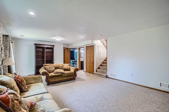 456 Ridge Ct, Chaska, MN 55318 - living area with a textured ceiling, carpet, stairs, and baseboards