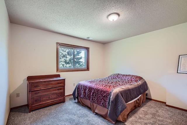 456 Ridge Ct, Chaska, MN 55318 - carpeted bedroom featuring a textured ceiling and baseboards