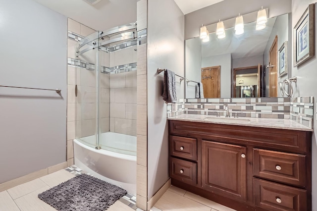 456 Ridge Ct, Chaska, MN 55318 - bathroom with vanity, enclosed tub / shower combo, baseboards, and tile patterned floors