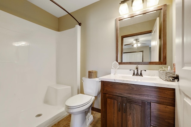 full bath with vanity, toilet, a shower, and tile patterned flooring