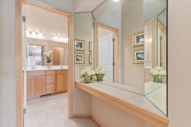 hallway featuring a sink