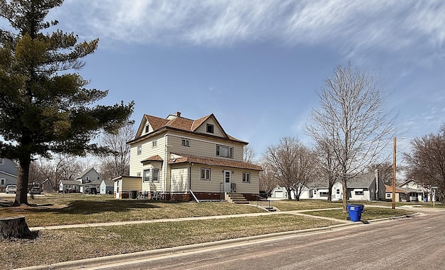 321 Western Ave, Madison, MN 56256 - view of property exterior with entry steps, a residential view, and a chimney
