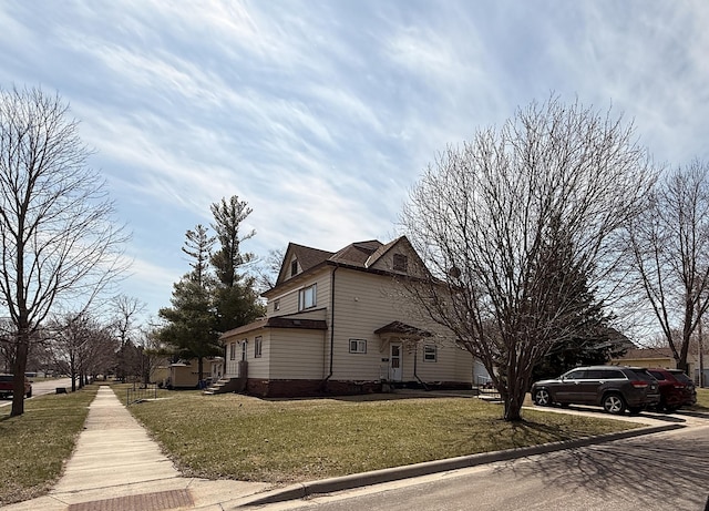 321 Western Ave, Madison, MN 56256 - view of property exterior with a lawn