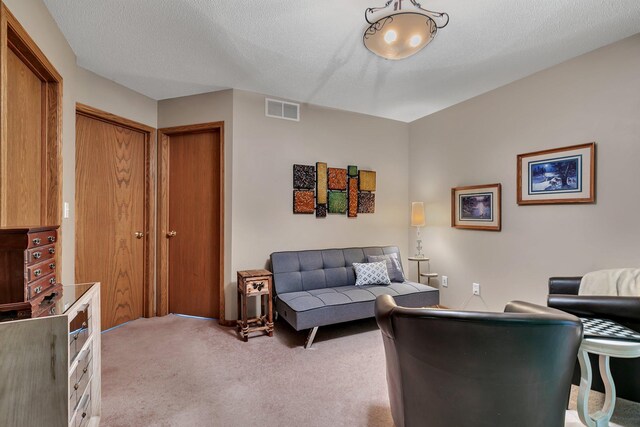 living room with light colored carpet