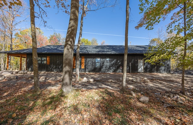 back of house featuring board and batten siding