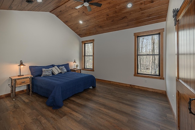 bedroom with lofted ceiling, recessed lighting, baseboards, dark wood-style flooring, and multiple windows