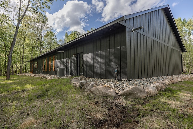 761 Ja Bird Loop NE, Longville, MN 56655 - view of side of property with an outbuilding and board and batten siding