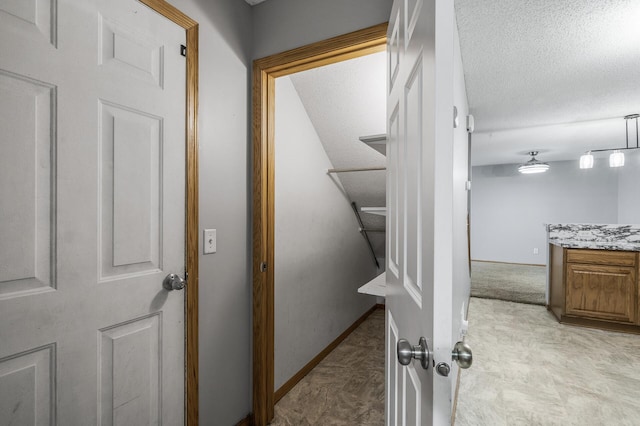 7327 Kalland Cir NE Unit 28, Otsego, MN 55301 - corridor with a textured ceiling and baseboards