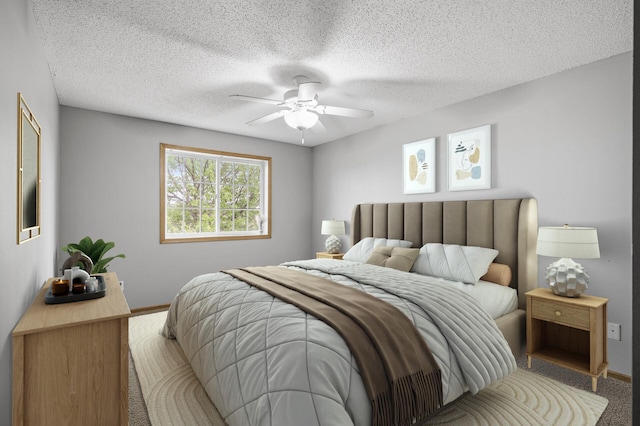 7327 Kalland Cir NE Unit 28, Otsego, MN 55301 - bedroom with carpet, baseboards, a ceiling fan, and a textured ceiling