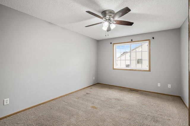 7327 Kalland Cir NE Unit 28, Otsego, MN 55301 - carpeted empty room featuring a ceiling fan, a textured ceiling, and baseboards