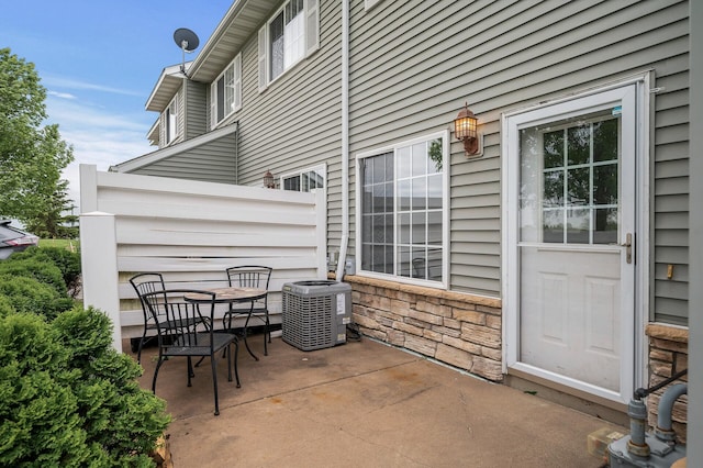 7327 Kalland Cir NE Unit 28, Otsego, MN 55301 - view of patio / terrace with central air condition unit and outdoor dining space