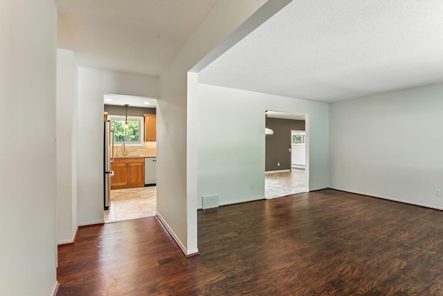 5820 139th St W, Apple Valley, MN 55124 - spare room featuring wood finished floors and baseboards