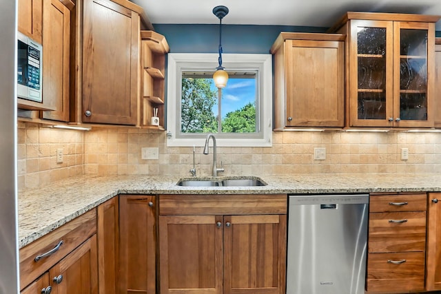 5820 139th St W, Apple Valley, MN 55124 - kitchen with appliances with stainless steel finishes, tasteful backsplash, and glass insert cabinets