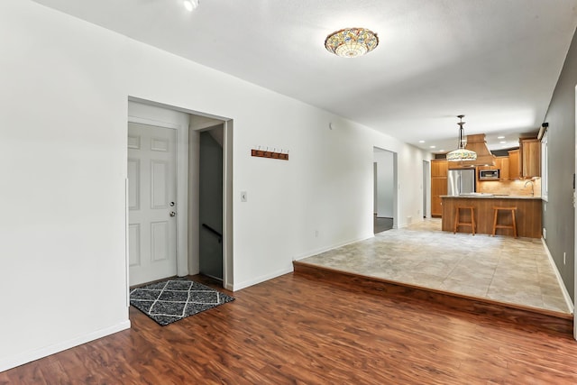 5820 139th St W, Apple Valley, MN 55124 - unfurnished living room featuring wood finished floors