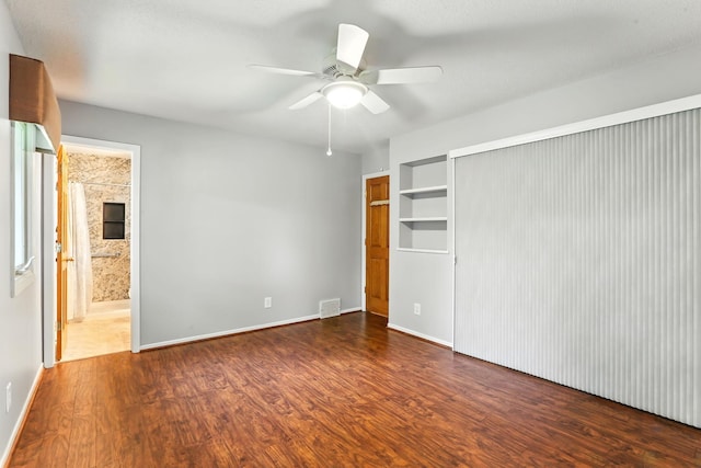 5820 139th St W, Apple Valley, MN 55124 - unfurnished bedroom with wood finished floors, connected bathroom, and ceiling fan