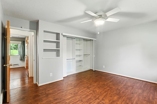 5820 139th St W, Apple Valley, MN 55124 - unfurnished bedroom featuring dark wood-style floors, a closet, and ceiling fan