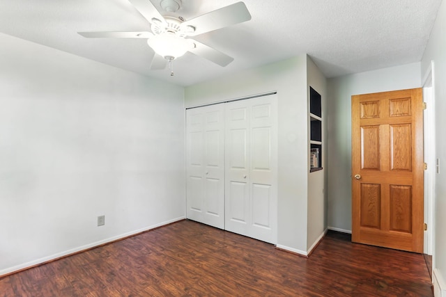 5820 139th St W, Apple Valley, MN 55124 - unfurnished bedroom with wood finished floors, a closet, ceiling fan, and a textured ceiling