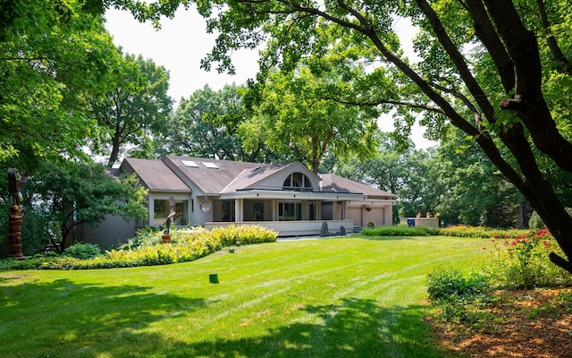 9002 Riley Lake Rd, Eden Prairie, MN 55347 - view of front of home featuring a garage and a front lawn