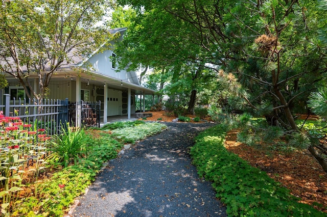 9002 Riley Lake Rd, Eden Prairie, MN 55347 - view of side of property featuring asphalt driveway