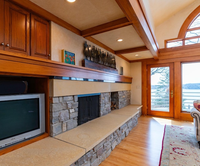 9002 Riley Lake Rd, Eden Prairie, MN 55347 - living room with a stone fireplace, light wood-style floors, beamed ceiling, and recessed lighting