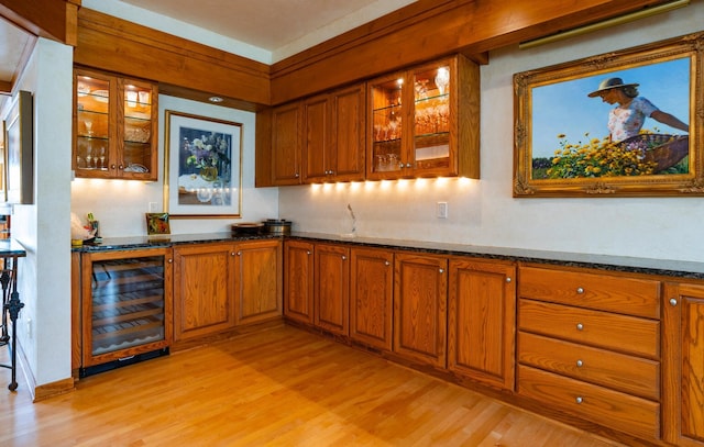 9002 Riley Lake Rd, Eden Prairie, MN 55347 - indoor dry bar with wine cooler and light wood-type flooring