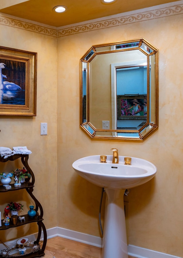 9002 Riley Lake Rd, Eden Prairie, MN 55347 - bathroom with baseboards, recessed lighting, and a sink