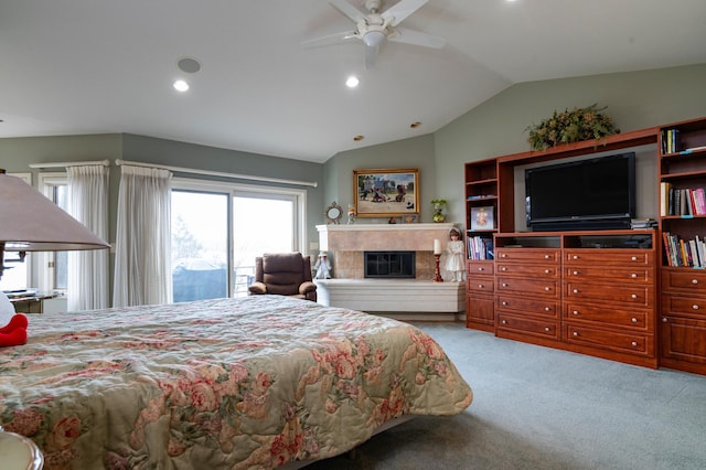 9002 Riley Lake Rd, Eden Prairie, MN 55347 - carpeted bedroom featuring lofted ceiling, a glass covered fireplace, recessed lighting, access to exterior, and a ceiling fan
