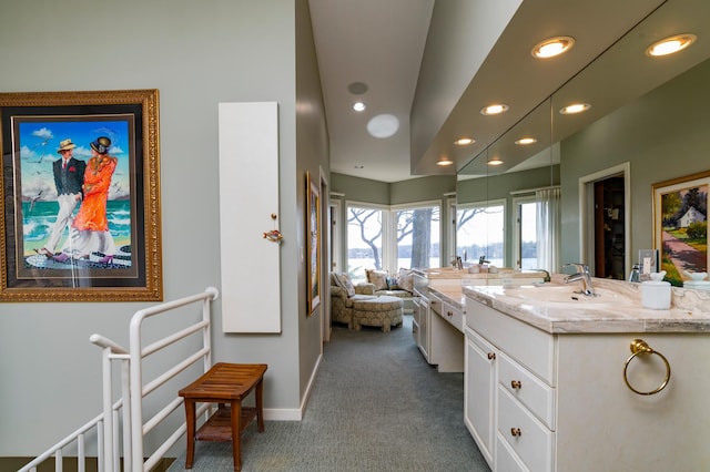 9002 Riley Lake Rd, Eden Prairie, MN 55347 - full bathroom with recessed lighting, vanity, and baseboards
