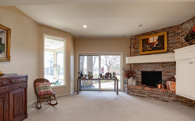 9002 Riley Lake Rd, Eden Prairie, MN 55347 - living area featuring light colored carpet, baseboards, a fireplace, and recessed lighting