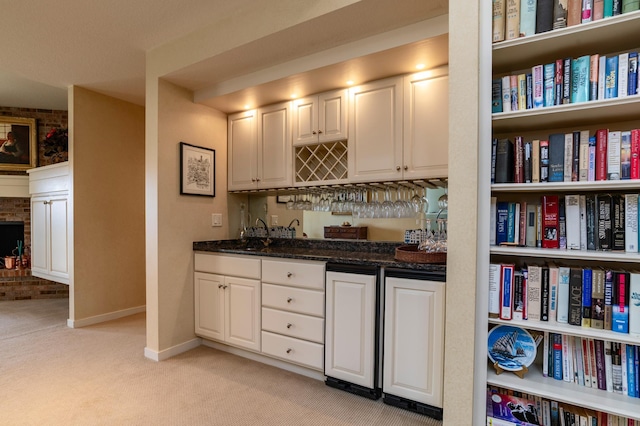9002 Riley Lake Rd, Eden Prairie, MN 55347 - indoor wet bar featuring light colored carpet, baseboards, and fridge