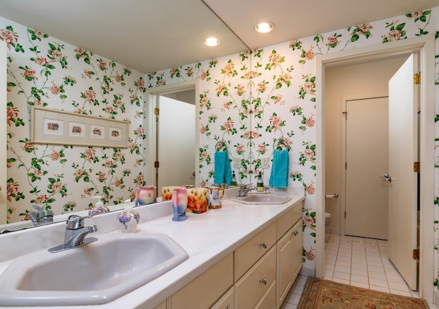 9002 Riley Lake Rd, Eden Prairie, MN 55347 - bathroom with wallpapered walls, tile patterned flooring, double vanity, toilet, and recessed lighting