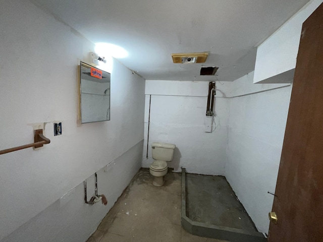 125 1st St, Dresser, WI 54009 - full bathroom with concrete flooring, toilet, and a shower