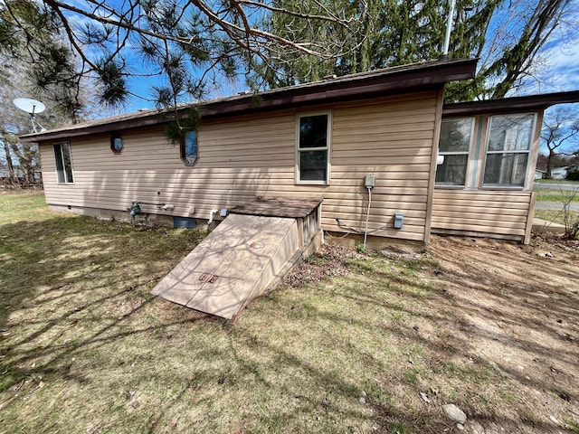 125 1st St, Dresser, WI 54009 - back of property with crawl space