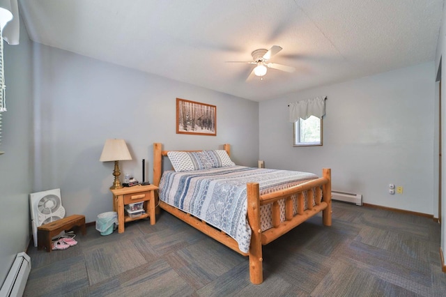bedroom featuring a baseboard heating unit, carpet floors, ceiling fan, and baseboards