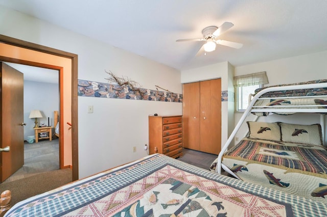 bedroom with carpet flooring, a closet, and ceiling fan