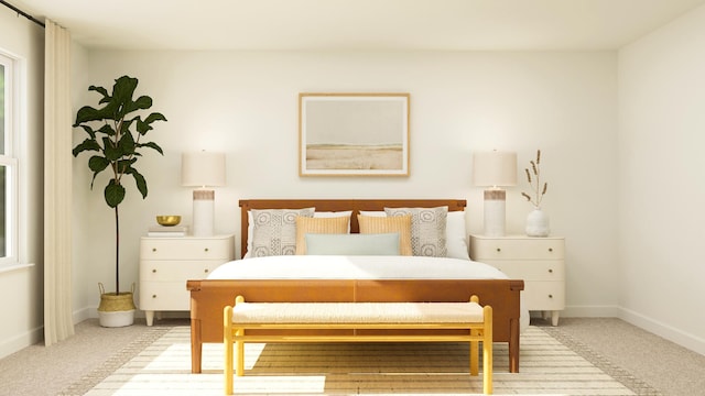 bedroom featuring carpet flooring and baseboards