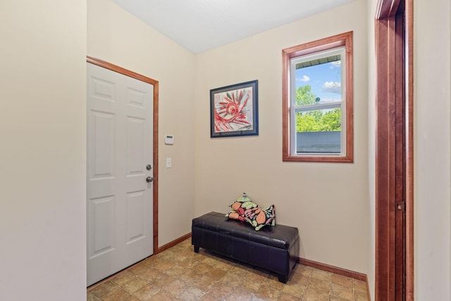 12800 Garrett Ct, Apple Valley, MN 55124 - entrance foyer featuring baseboards and stone finish flooring